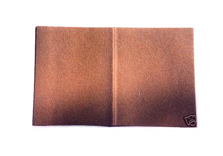 The sandpaper cover of Debord's Memoires. Images from eBay